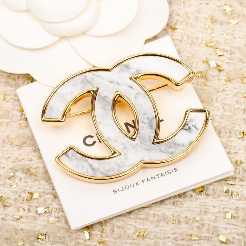 Ch*el brooches